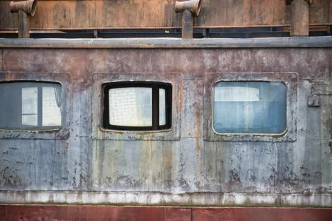 Abandoned distinctive dormer windows in close up Close-up shot of abandone... Stock Photos
