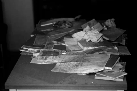 Abandoned documents on table in abandoned building Stock Photos