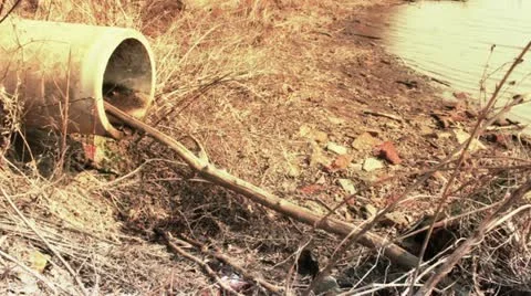 Abandoned drainage pipe Stock Footage 10887030