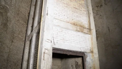 Abandoned elevator shaft structure inside cave chamber in Emen Canyon Stock Footage 305231906