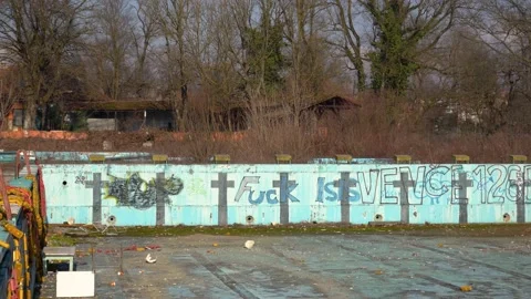 Abandoned empty outdoor Olympic pool Stock Footage 169576271