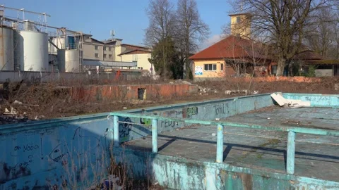 Abandoned empty outdoor swimming pool Stock Footage 169575365