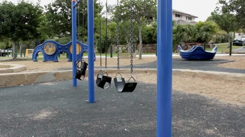 Abandoned empty playground with swings Stock Footage 55117874