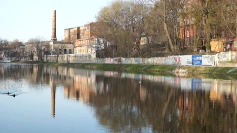 Abandoned factory on the lake Stock Footage 181040448