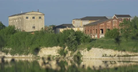 Abandoned Factory on Sandpit ,Close, on River Bank, Blu Sky on Background Stock Footage 50861992