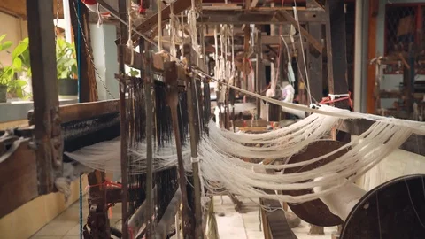Abandoned foot-treadle loom machine with threads Stock-Footage 90708956