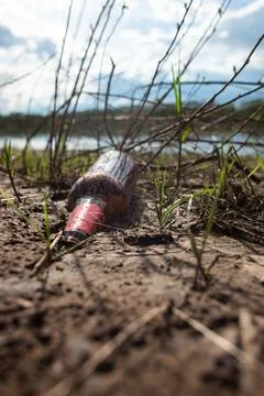 Abandoned garbage in nature. Environmental damage caused by garbage pollution Stock Photos