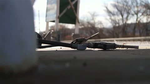 Abandoned Gas Pump Nozzle Lying on the Ground Video stock 22242876