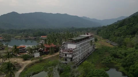 Abandoned Ghost Ship Hotel Decaying in Tropical Jungle in Ko Chang, Thailand Stock Footage 335571399