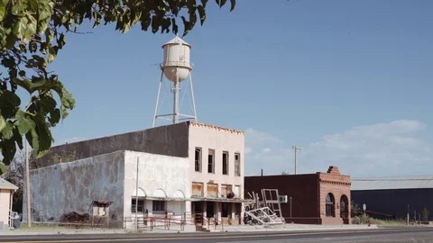 Abandoned Ghost Town with Water Tower Stock Footage 80833942