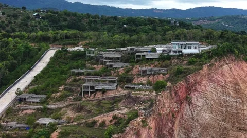 Abandoned Hillside Villa Construction Site on Tropical Island Aerial Drone View Stock Footage 336429378