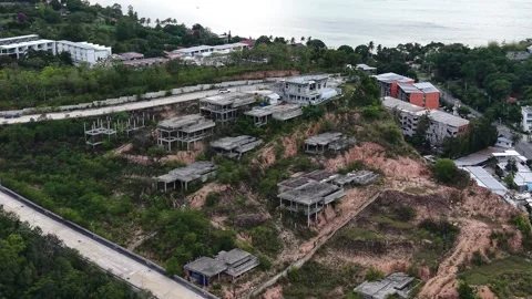 Abandoned Hillside Villa Construction Site on Tropical Island Aerial Drone View Vidéo 336429407