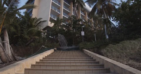 Abandoned hotel devastated by hurricane damage Stock Footage 124750990