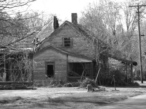 Abandoned House on the Corner Stock Photos