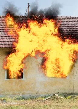 Abandoned house on fire Stock Photos
