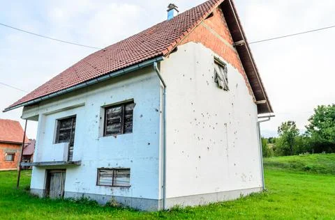 Abandoned House Remained Damaged after the Civil War in Croatia Stock Photos