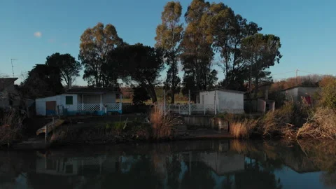 Abandoned house on a river Stock Footage 150903566
