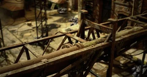 Abandoned industrial site featuring rusty structures and worn pathways Stock Illustration