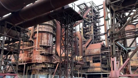 Abandoned industrial site with lots of pipes and heavy machinery in Ostrava Stock Footage 265487565