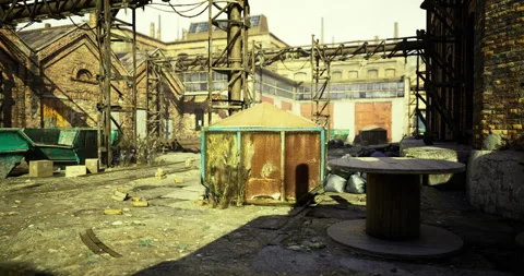 Abandoned industrial site with rusty structures and debris in daylight Stock Footage 309184487