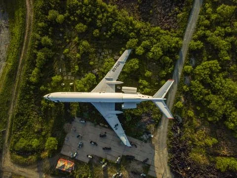 An abandoned large plane on the background of a blue warm sea, footage taken fro Stock Photos