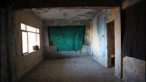 Abandoned Large Room Interior with Peeling Walls and Window Light Stock Footage 332150731
