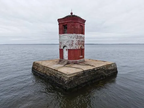 Abandoned lighthouse buoy Stock Photos