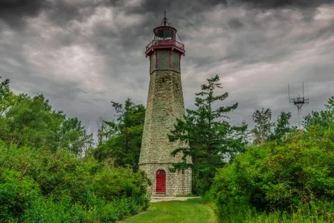 An abandoned lighthouse in a cloudy day Foto stock
