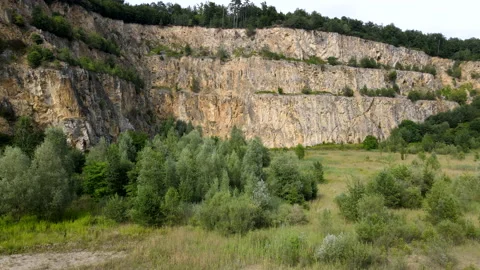 Abandoned lime stone quarry pit, Aerial Drone view in 4k, renaturation Video stock 159068611