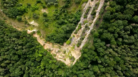 Abandoned lime stone quarry pit, Aerial Drone view in 4k, renaturation Video stock 159070246