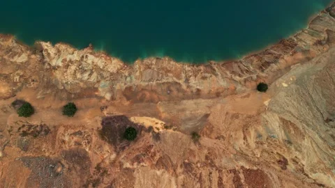 Abandoned  mining mine with turquoise blue water on the outskirts of Tsar Asen Видео 230434338