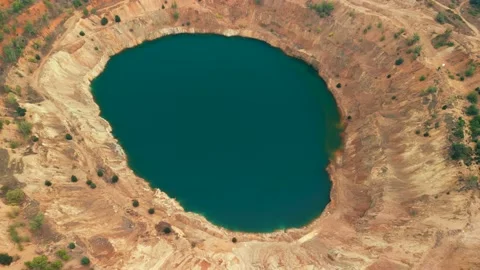 Abandoned  mining mine with turquoise blue water on the outskirts of Tsar Asen Видео 230434463