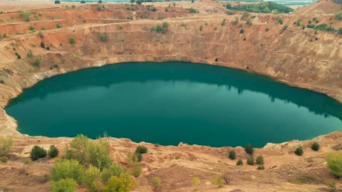 Abandoned  mining mine with turquoise blue water on the outskirts of Tsar Asen Video stock 230434711