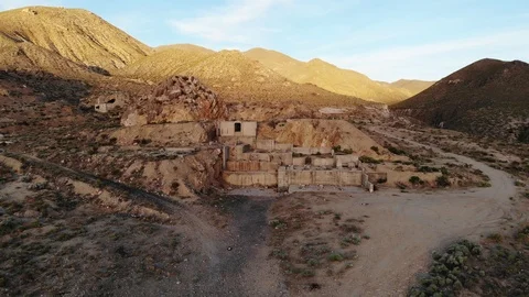 Abandoned Mining Ruins and Mill Site in the Nevada Desert at Sunset - Aerial Stock Footage 112639971