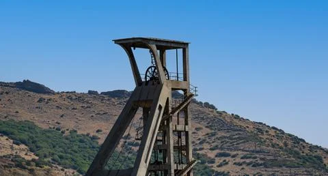 Abandoned Mining Structure in Rural Landscape Stock Photos