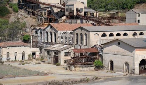 Abandoned Mining Structure in Rural Landscape Stock Photos