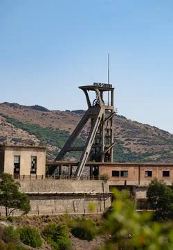 Abandoned Mining Structure in Rural Landscape Stock Photos