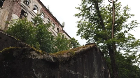 Abandoned multi-storey house in the town of Tkuarchal, Abkhazia Stock Footage 110594290