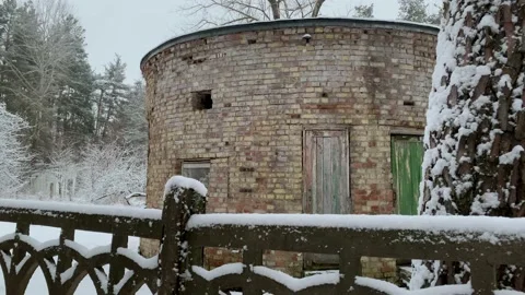 Abandoned old building in forest. Winter. Fence in the snow. Stock Footage 167079420
