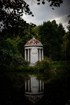 An abandoned old gazebo for tea drinking that has been preserved in Russia Stock Photos