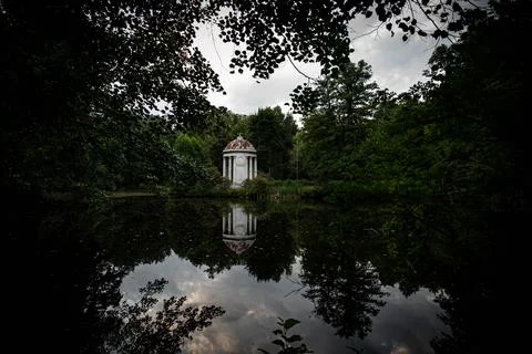 An abandoned old gazebo for tea drinking that has been preserved in Russia si Stock Photos