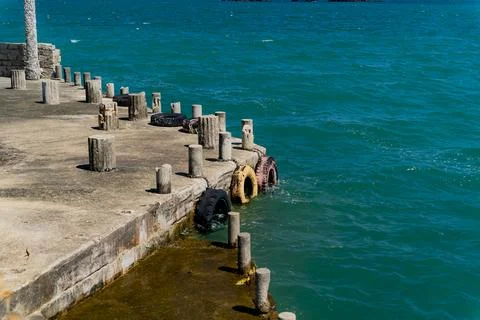 An abandoned old pier. Stock Photos