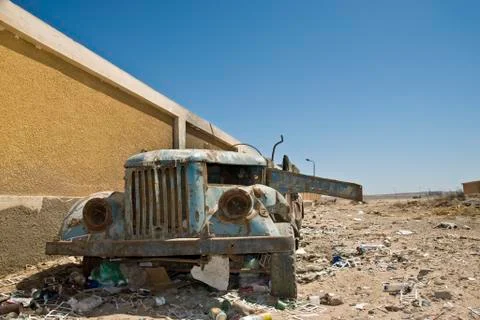 Abandoned old rusty car. 库存照片