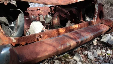 Abandoned Old Rusty Car - Skeleton in Wilderness Stock Footage 112053269