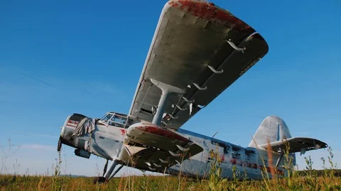 Abandoned old small propeller plane. Airplane graveyard. Stock Footage 120602178