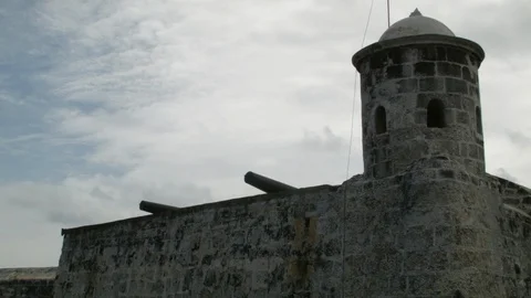 Abandoned old stone building with cloudy sky in background, Cuba Stock Footage 142210636