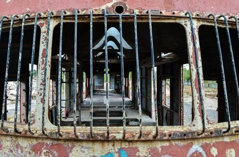 Abandoned old train with rust and graffitis Stock Photos