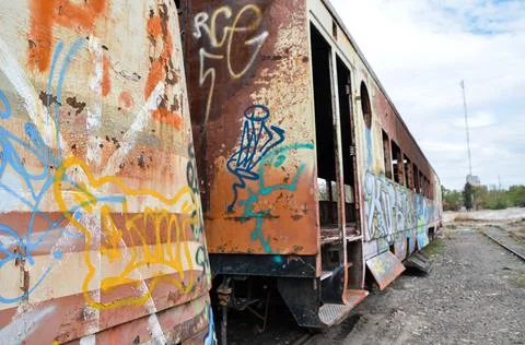 Abandoned old train with rust and graffitis Foto stock