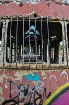 Abandoned old train with rust and graffitis Stock Photos