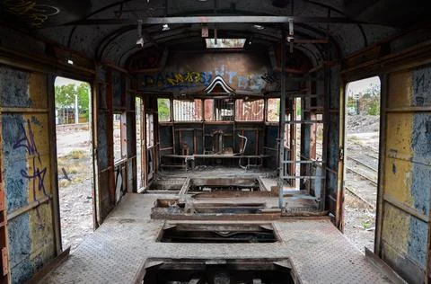 Abandoned old train with rust and graffitis Stock Photos